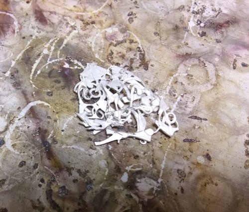 Judy Larson's Make a Lacy Argentium Scrap Metal Sheet - , General Education, Butane Torch, Soldering, Solder, Layer them on a Solderite board.